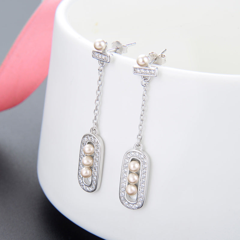 Subtle stud pearl earrings sterling silver