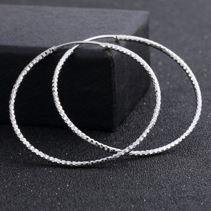 Dainty sterling silver hoop earrings