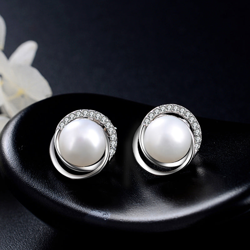 Delicate pearl cluster stud earrings