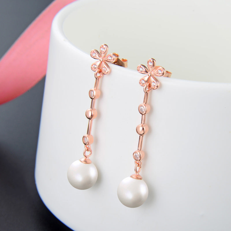 Pearl stud earrings rose gold