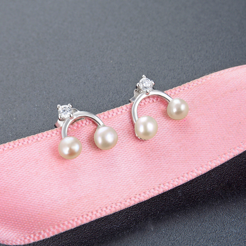 Costly stud pearl earrings real