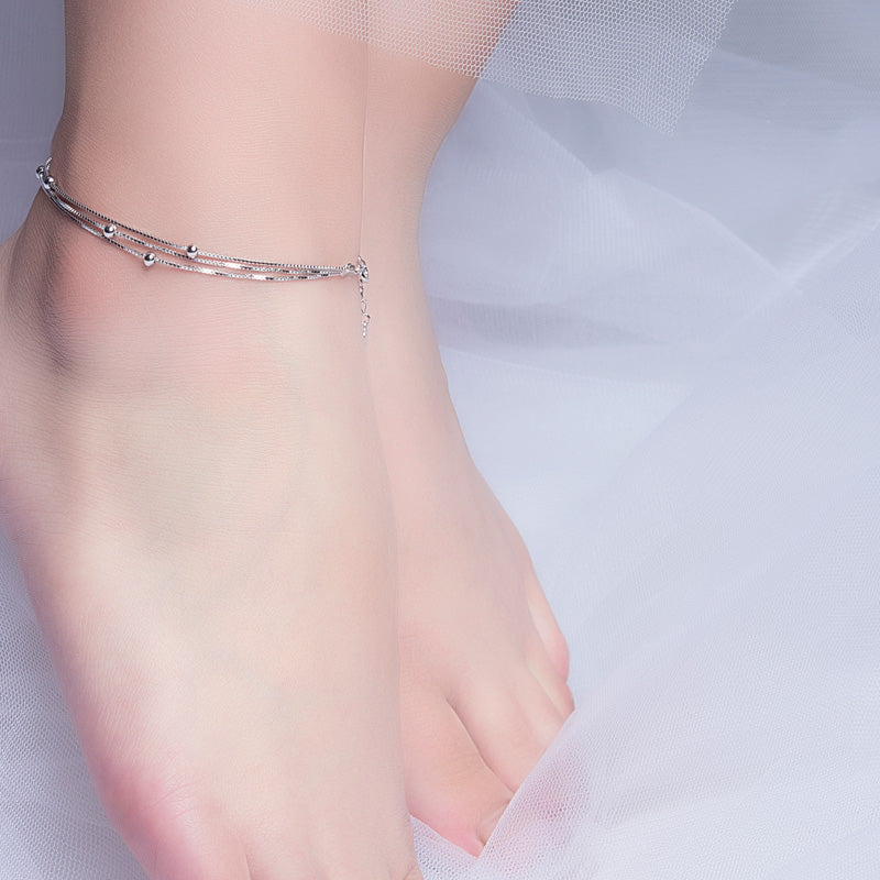 Wearing an ankle bracelet meaning