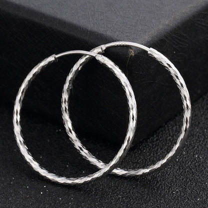 Delicate sterling silver hoop earrings