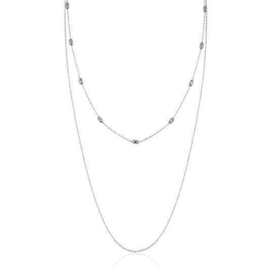 Delicate silver necklace layer