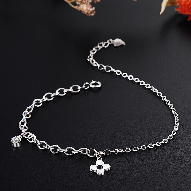 Silver four leaf clover bracelet