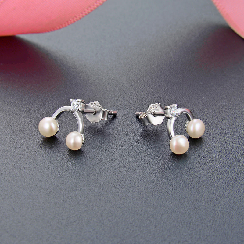 Costly stud pearl earrings real