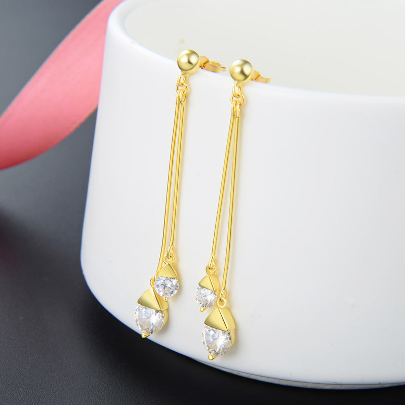 Delicate gold jewelry earrings