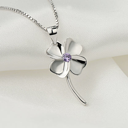 Delicate silver flower necklace meaning