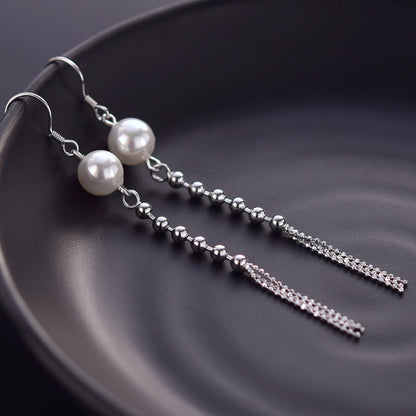 Dainty pearl earrings dangle