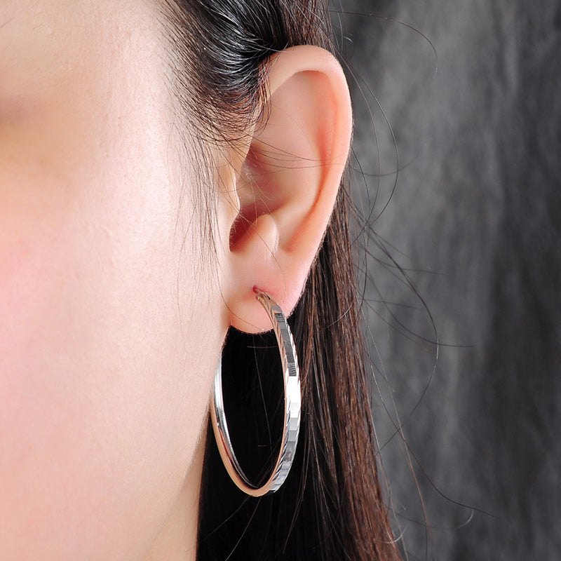 Delicate silver hoop earrings