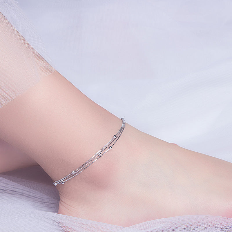 Wearing an ankle bracelet meaning