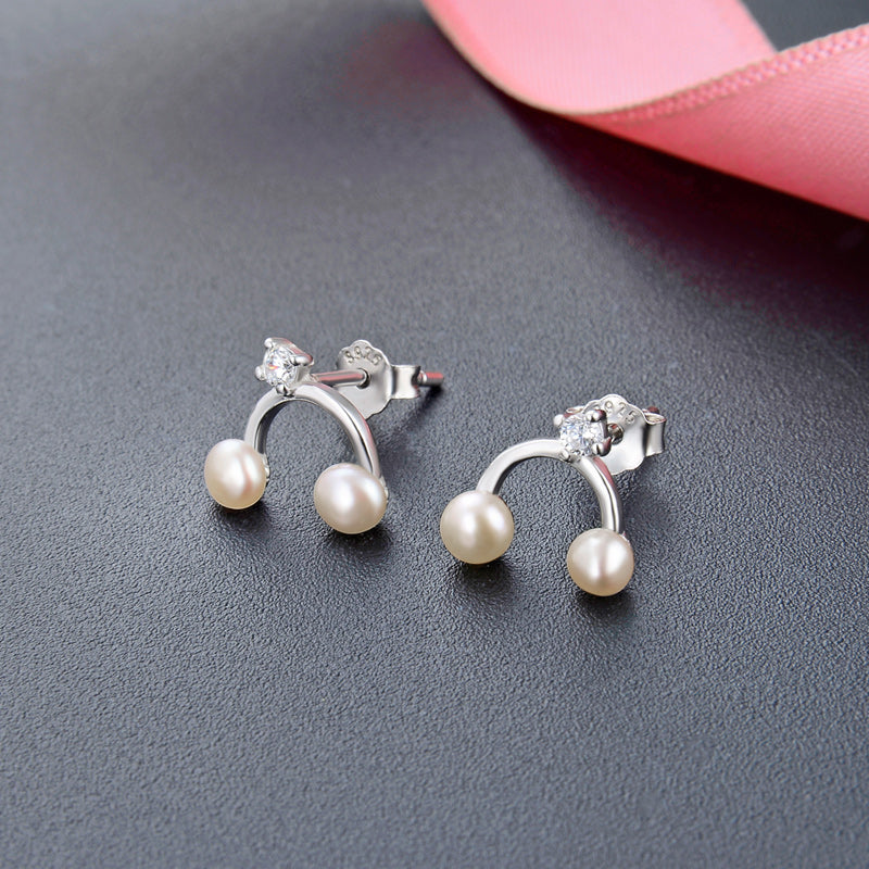 Costly stud pearl earrings real