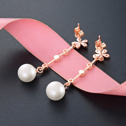 Pearl stud earrings rose gold