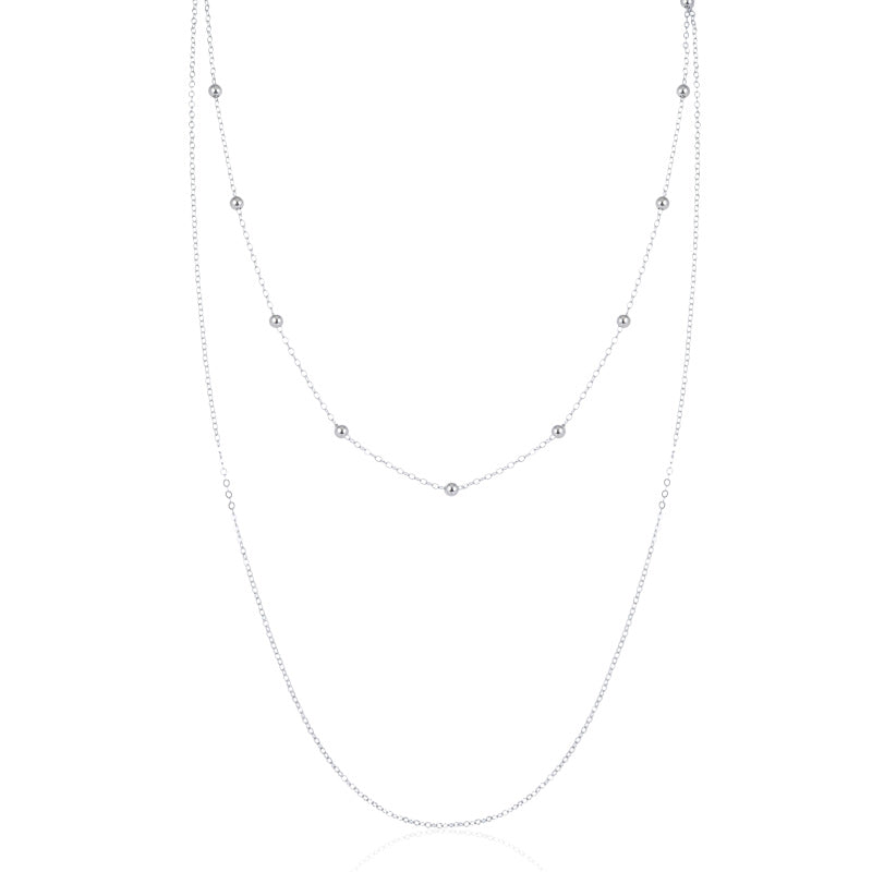 Dainty silver necklace layered