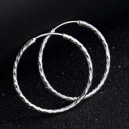 Delicate sterling silver hoop earrings