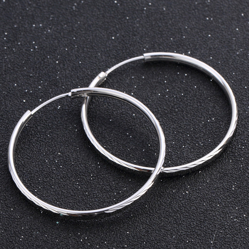 Delicate silver hoop earrings