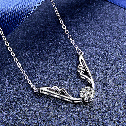 Glittering angel wing necklace silver