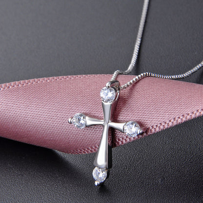 Delicate cross charm necklace