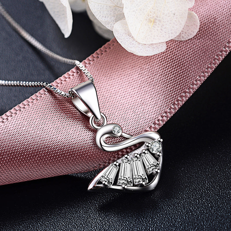 Delicate silver swan necklaces