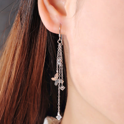Delicate silver ear threads