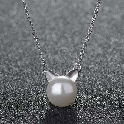 Delicate pearl pendant necklace
