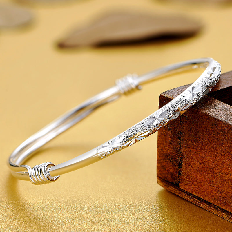 Silver bangle bracelet with clasp