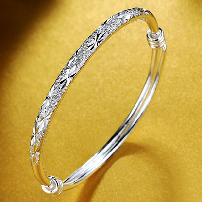 Silver bangle bracelet with clasp