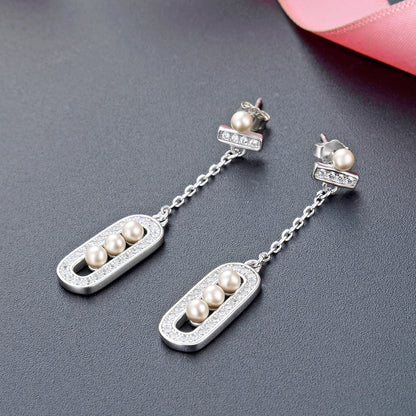 Subtle stud pearl earrings sterling silver