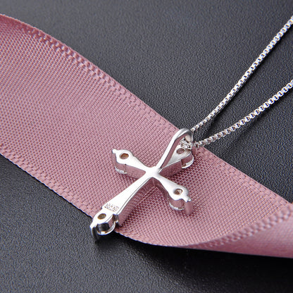 Delicate cross charm necklace